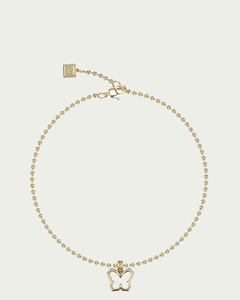 Front of a size O/S Y2K Butterfly Charm Necklace in Gold/Clear in Gold/Clear by F+H Studios. | dia_product_style_image_id:331097